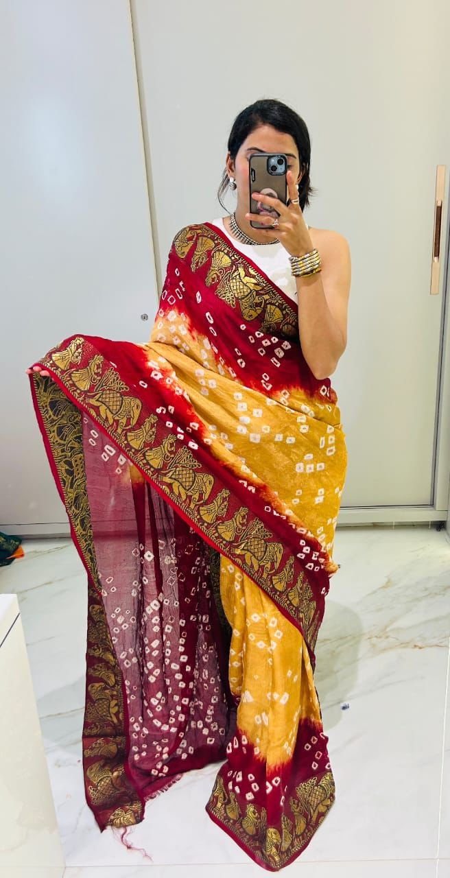 Mustard and maroon bandhani saree pallu with zari border