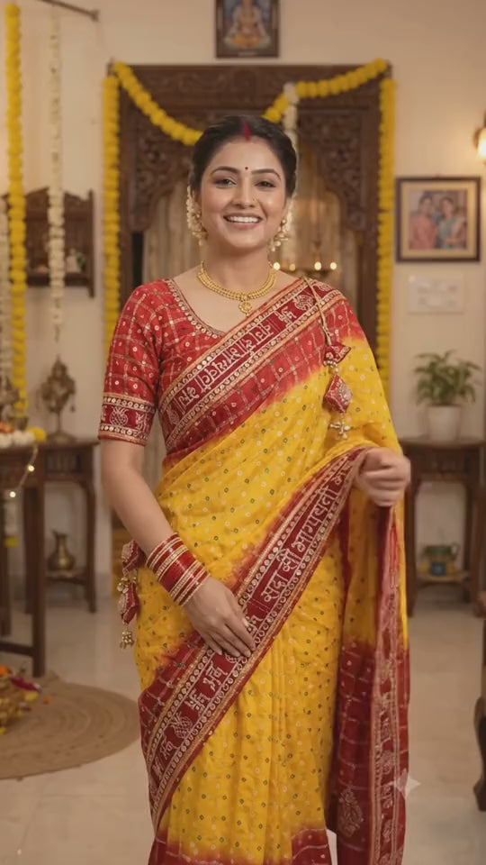 Woman wearing the yellow and red Sada Saubhagyavati saree
